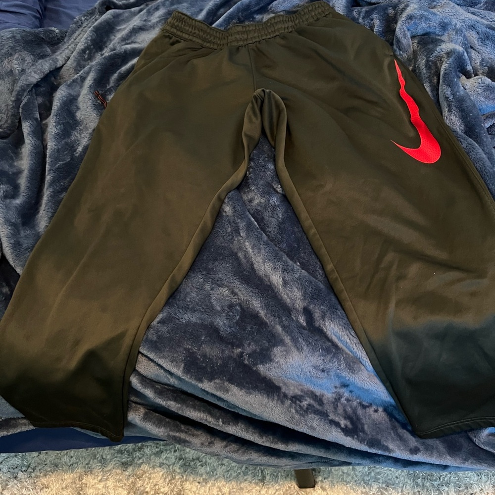Nike men green Joggers with Red Swoosh